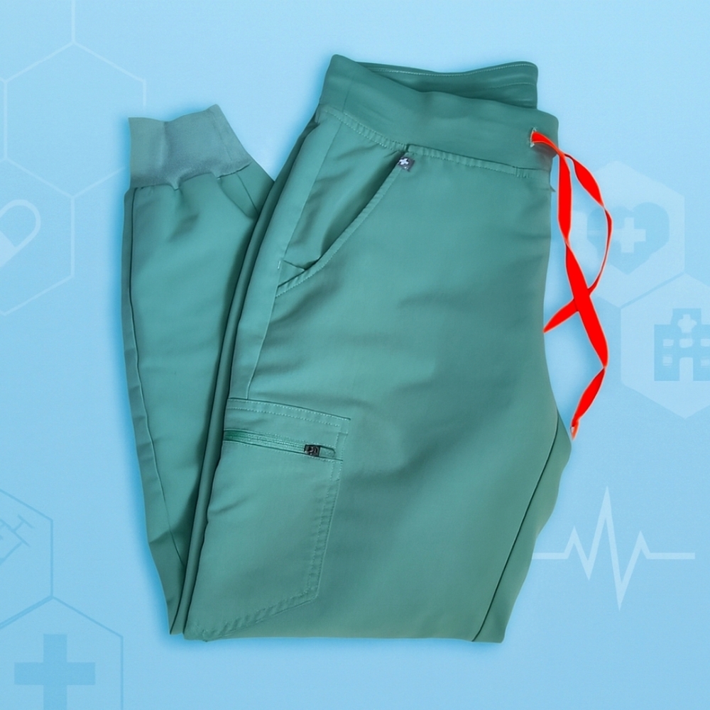 Figs Women's Surgical Green Jogger scrub pants with orange Drawstring